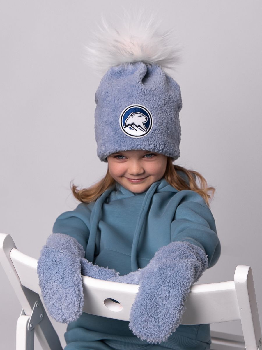 Умка помпон шапочка 020/1 экомех тедди на фл.п. голубой р-р 54-55